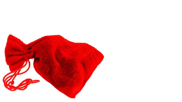 istock Close up view of red little present bag isolated on white background. 1285699409