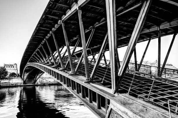 Paris, France - July 4, 2019: Architectural details and padlocks of the Passerelle Léopold-Sédar-Senghor footbridge in Paris France