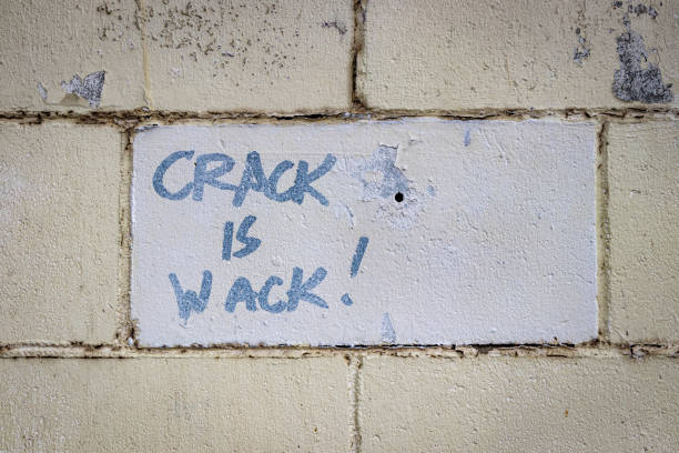 Crack is wack sign A message about drugs written on a brick wall that says crack is whack spelled incorrectly wack stock pictures, royalty-free photos & images