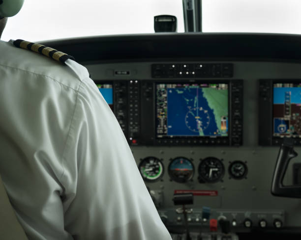 istock Over the pilot's shoulder at the console 1285710653