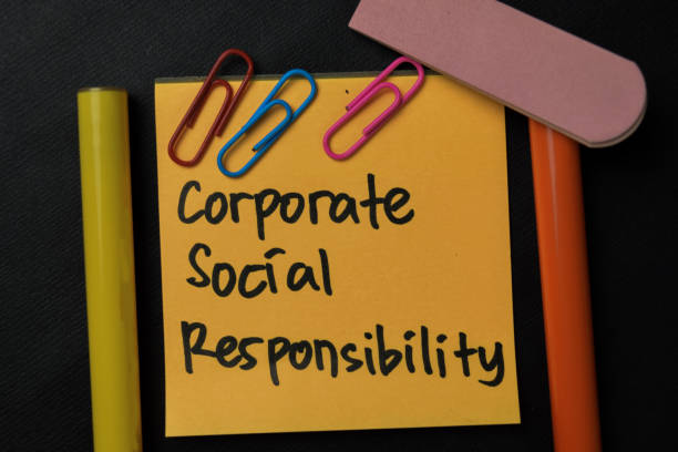 istock Corporate Social Responsibility write on sticky notes isolated on office desk. 1285712327