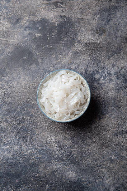 shirataki noodles in gray bowl on gray background - clothing traditional culture chinese culture black imagens e fotografias de stock