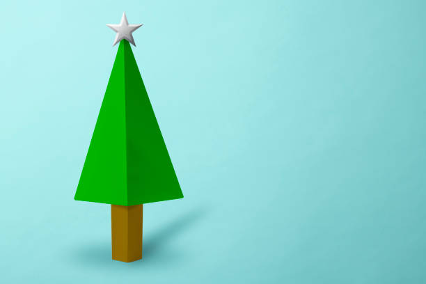 istock Paper Christmas tree on light blue background 1285715597
