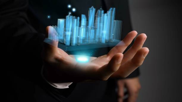 istock Businessman holds 3D city model showing augmented reality technology 1285717687