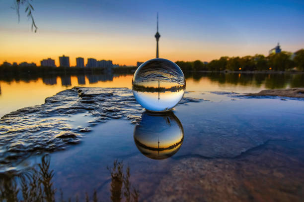 istock Crystal ball and city skyline 1285720314