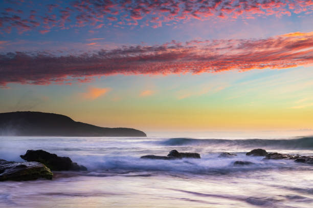 istock Beautiful sunrise with high cloud at the seaside 1285725130