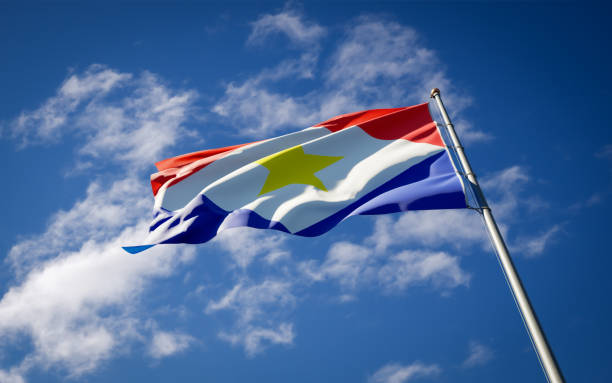 istock National state flag of Saba fluttering at sky background. 1285726818