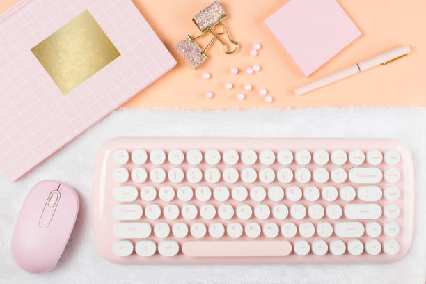 istock flat lay pink stationery on work desk 1285733111