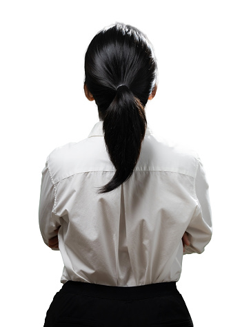 Asian woman finger point wear white shirt rear view isolated on white background