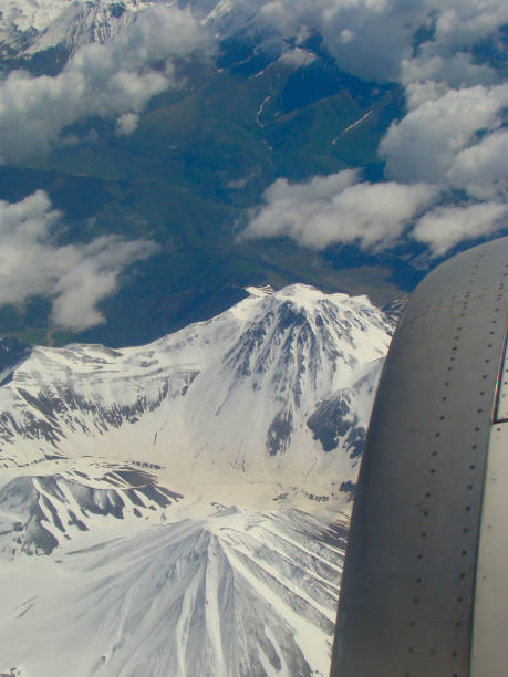 istock snow-capped mountains. the Caucasus Mountains. view from airplane 1285736002