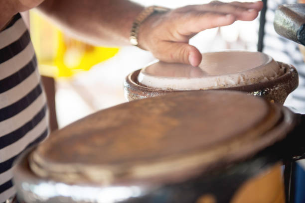 Musician plays bongos