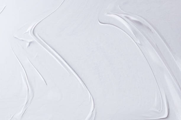 istock Blank white crumpled and creased paper poster texture background 1285738933