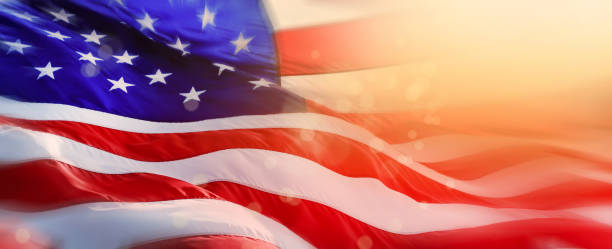 istock Close up waving American flag and light 1285741161