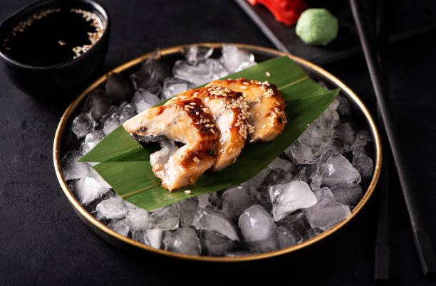 istock eel sashimi on ice in a black plate 1285742598