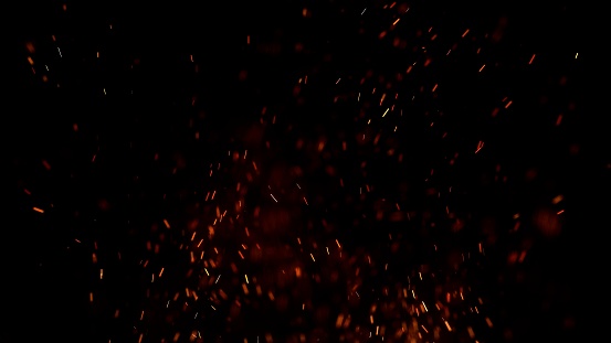 Realistic Burning fire sparks and embers with illuminating light effects on a dark background.4k High quality, 3D render