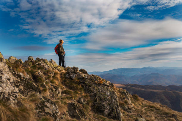 istock Woman traveler in a mountains 1285747391