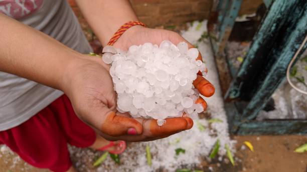 istock Large hail ice balls after heavy summer storm, hail storm 1285747949