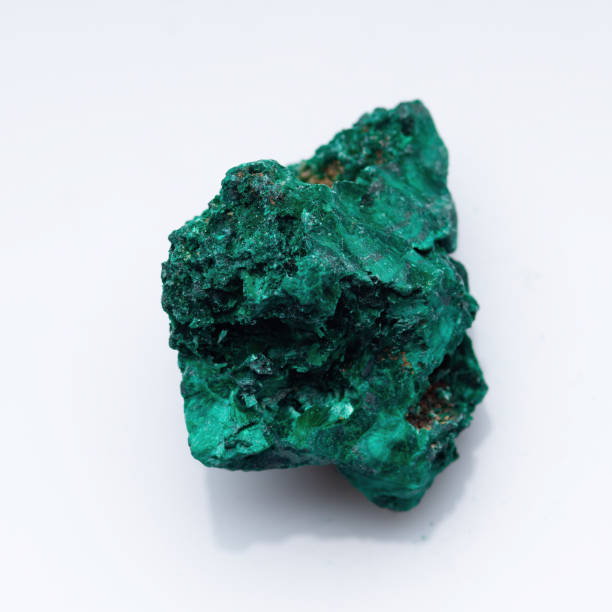 istock Malachite green ore on a white background. Natural green malachite 1285749847