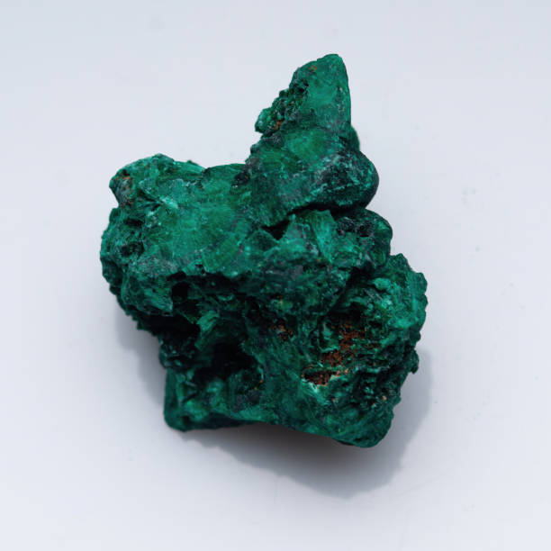 istock Malachite green ore on a white background. Natural green malachite 1285749855