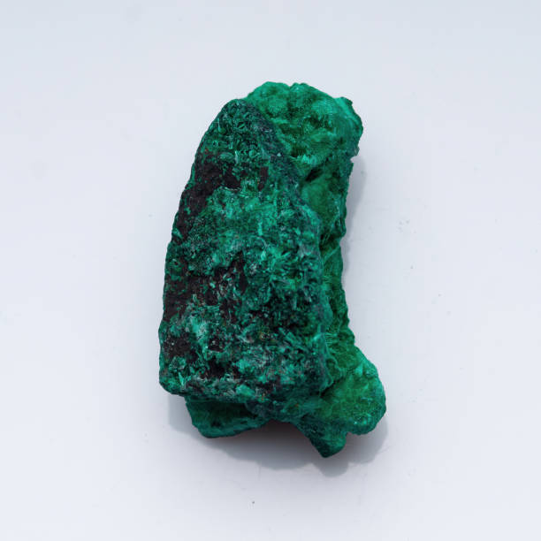 istock Malachite green ore on a white background. Natural green malachite 1285749876