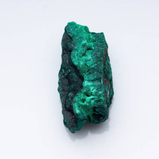 istock Malachite green ore on a white background. Natural green malachite 1285749891