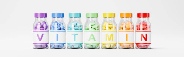 istock Vitamin Pills Bottles on White Background 1285755378