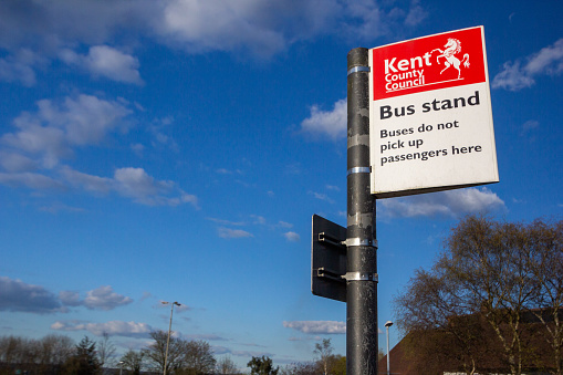 Kent County Council Bus Stand in Sevenoaks, England, with the KCC insignia on the sign