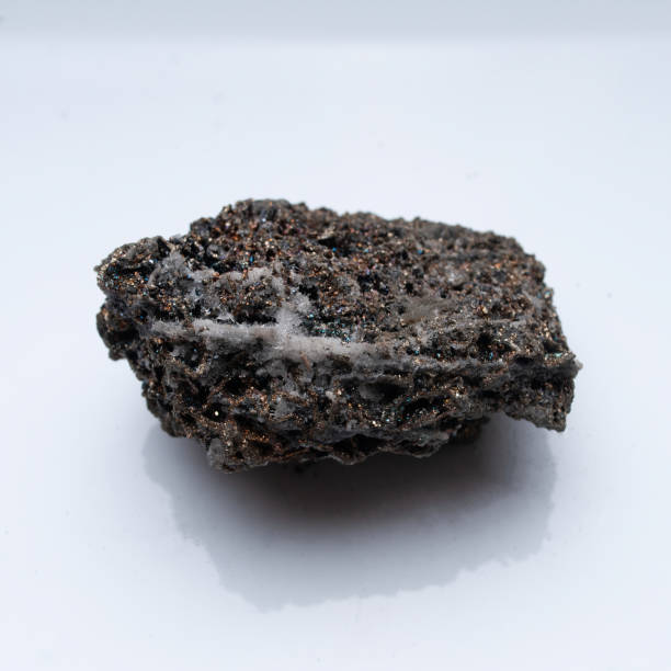 istock Natural mineral pyrrhotite on a white background 1285757488