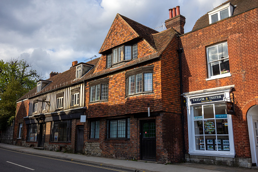 Stow on the Wold, Cotswolds, United Kingdom, August 15, 2023. Quaint charming traditional English village or town. High street and central market square. Summer day outdoors