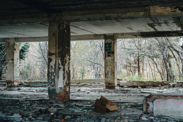 istock An abandoned Soviet building with broken windows and debris. Consequences of vandalism. 1285763486