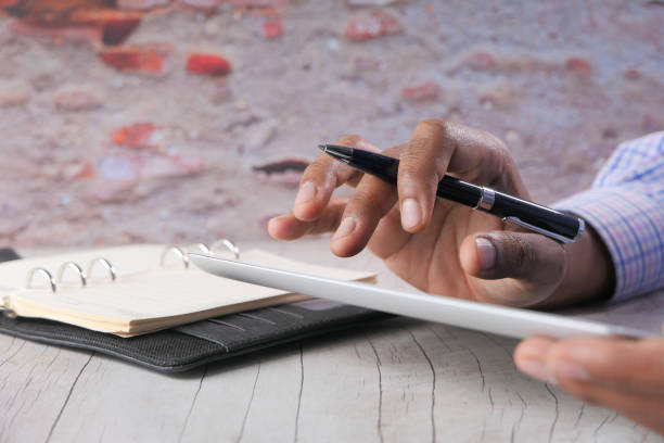 istock man's hand working on digital tablet on office desk 1285764168