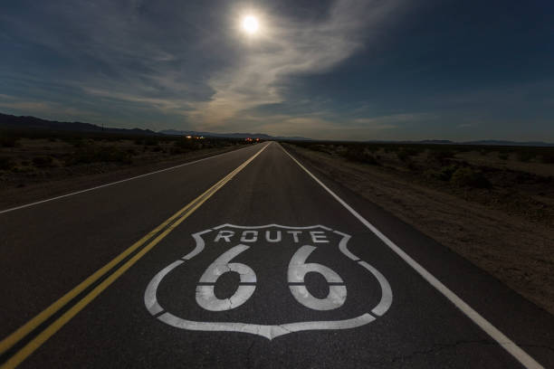 full moon over route 66 - route 66 road sign california imagens e fotografias de stock