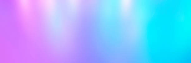 istock Blurred colorful multicolored background from lights. Iridescent holographic abstract bright neon colors backdrop. banner 1285765654