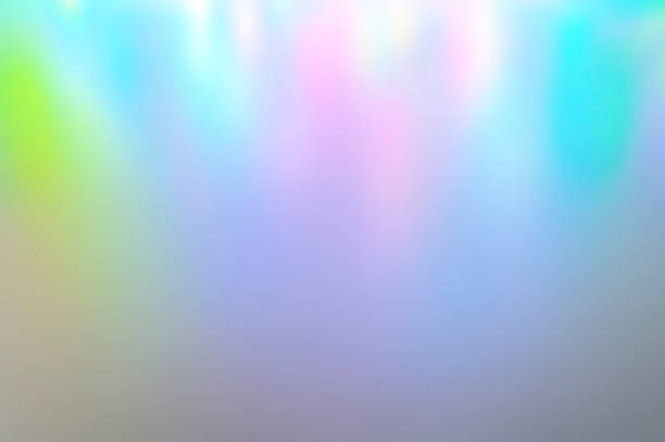 istock Iridescent holographic abstract aurora light neon colors background. Blurred pastel multicolored backdrop from lights 1285765674