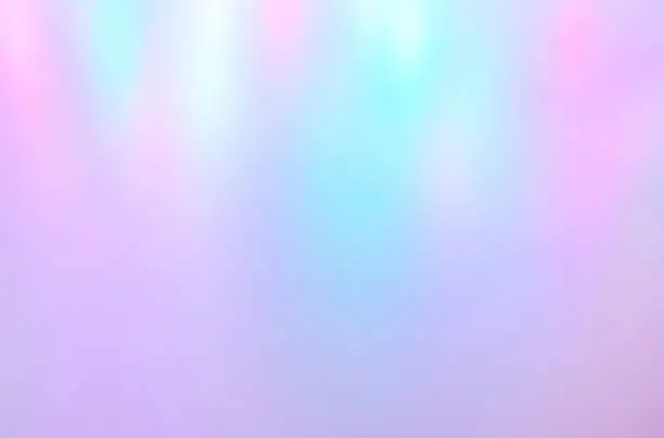 Photo of Iridescent holographic abstract aurora light neon colors background. Blurred pastel multicolored backdrop from lights