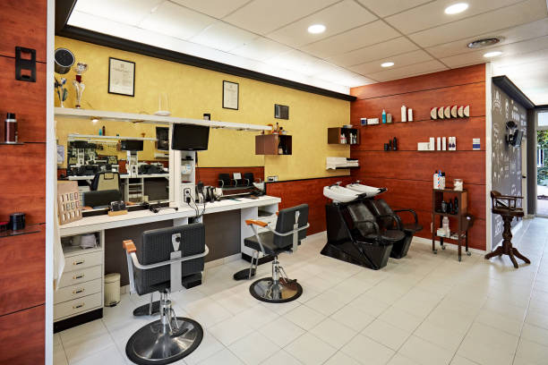 istock Modern Hair Salon Stations and Shampoo Sinks and Chairs 1285770446