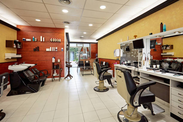 istock Shampoo Sinks and Styling Stations in Modern Hair Salon 1285770448