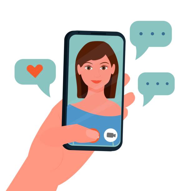 istock Hand holding mobile phone, video call, conversation. Face of girl on screen isolated on white background stock vector illustration. Social relations on distance concept. 1285771384