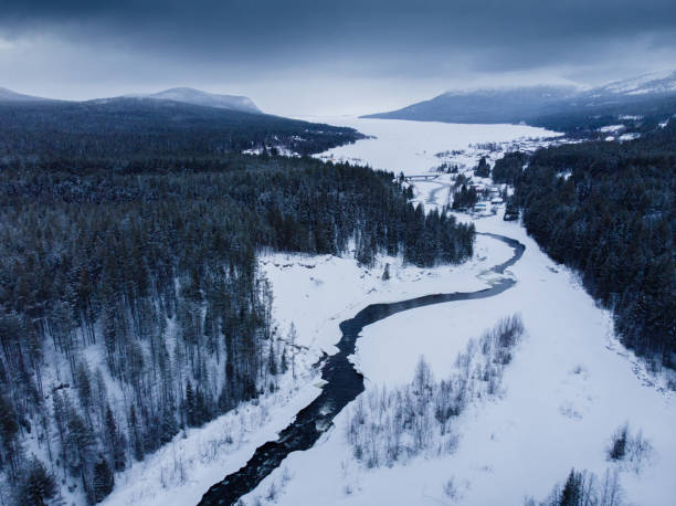 istock Winter landscape with river. aerial view 1285772758