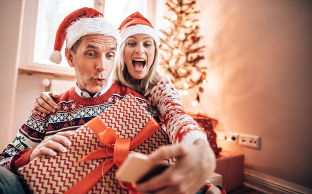 istock mature adult take a selfie for christmas 1285773848