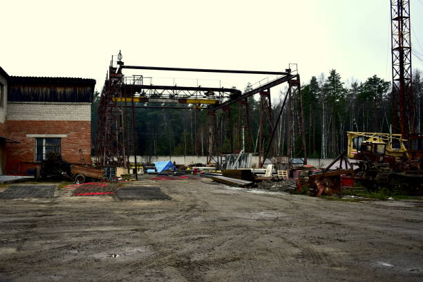 istock industrial site with old girder cranes 1285775405
