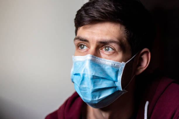 istock Corona Mask Portrait 1285779010