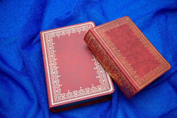 Ancient book on textile background Ancient book on textile background diary lock book cover book stock pictures, royalty-free photos & images