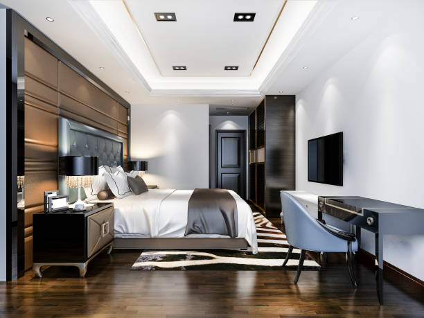 istock 3d rendering luxury bedroom suite in hotel with tv and working table 1285781795
