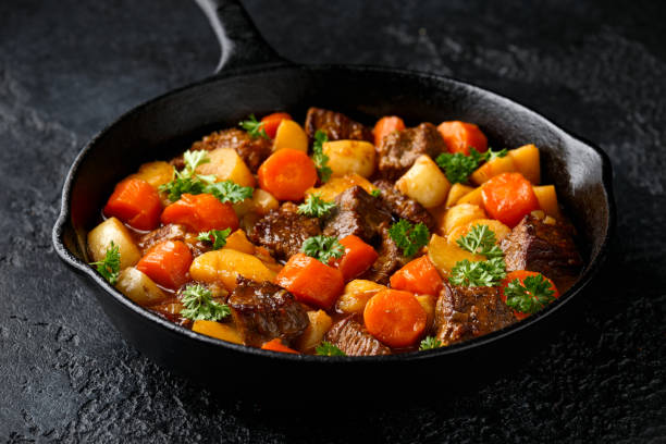 istock Beef Stew with carrot and baby potato in iron cast pan 1285782903