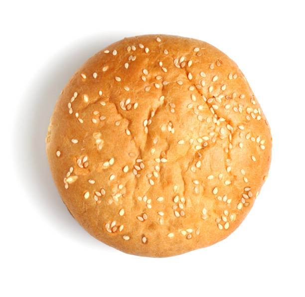 Sesame bun for hamburger or cheeseburger, close-up, isolate white background.