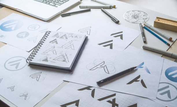 istock Graphic designer creative design sketch drawing logo Trademark brand Workspace 1285785018