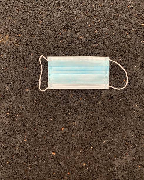 istock Surgical Face Mask Outdoors 1285787652