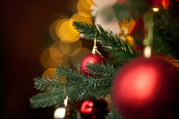 istock Decorated Christmas tree with bokeh on the background. 1285788599