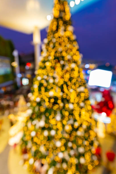 istock Abstract light of Christmas tree celebration blur background. 1285790583
